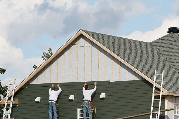 Professional Siding Contractor technician working in Medina, WA